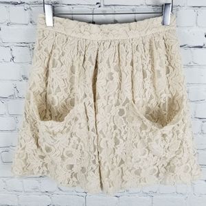 KIMCHI BLUE | lace back zip pocket skirt